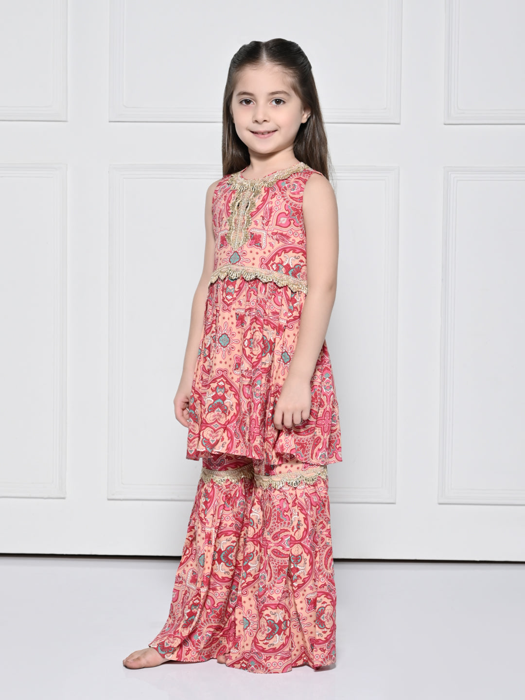 Peach and Pink Abstract - A Peach and Pink Sleeveless Rayon Suit for Girls