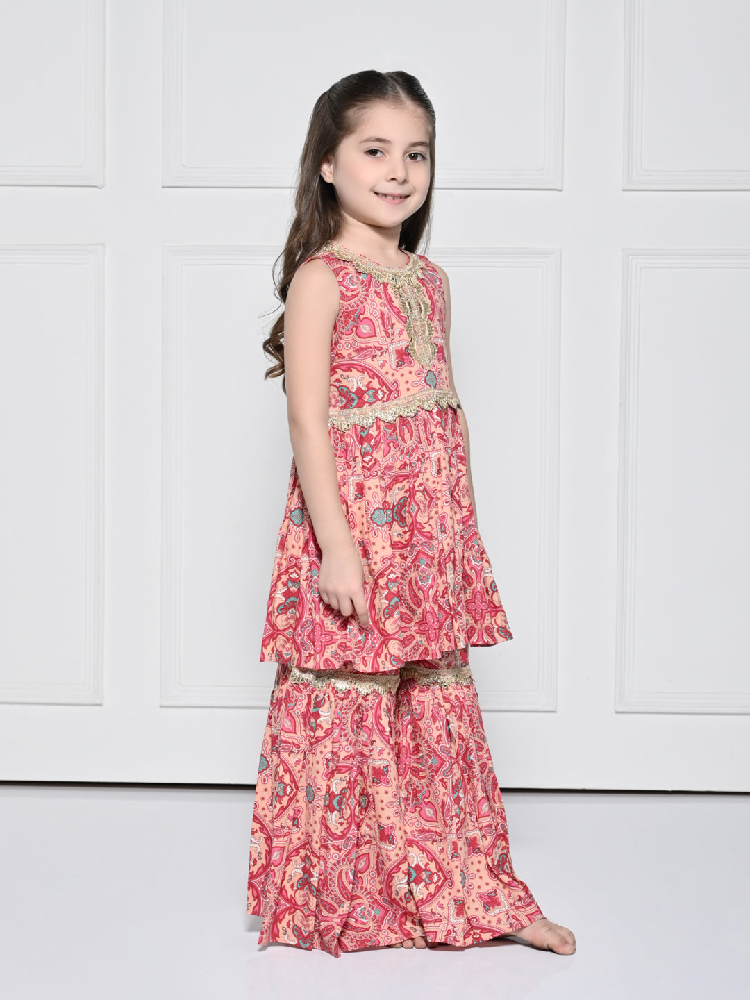Peach and Pink Abstract - A Peach and Pink Sleeveless Rayon Suit for Girls