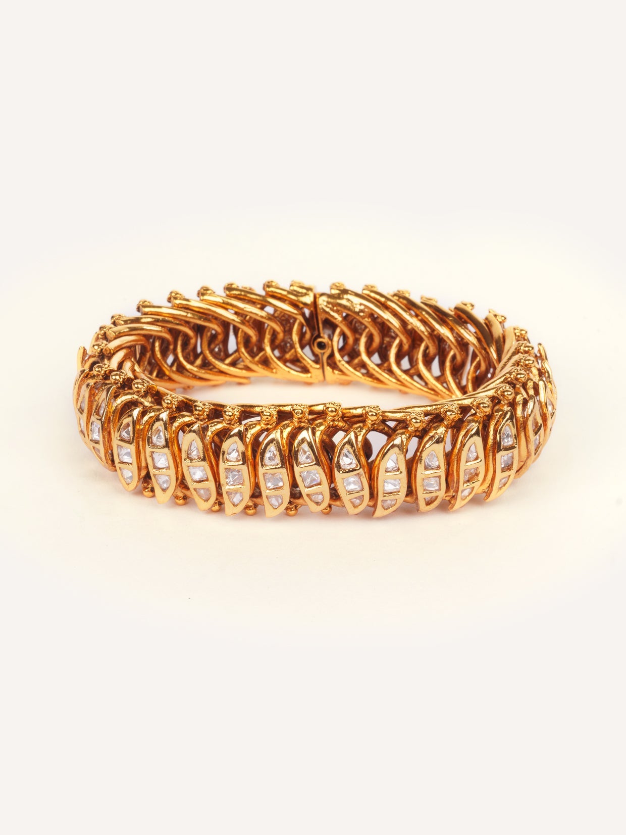 Reeva Jalebi Style Gold Finish Kundan Bracelet