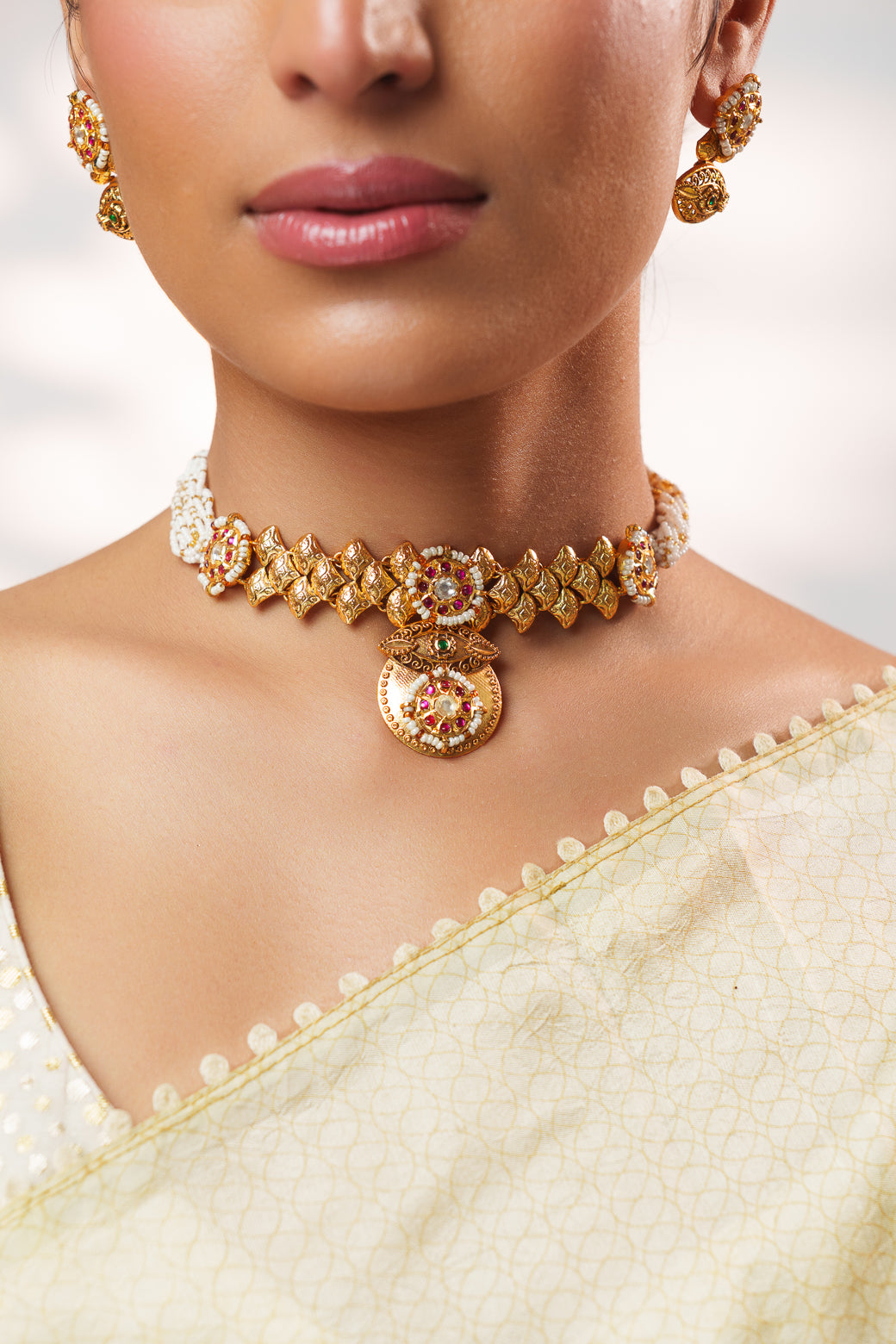 Avnika Gold Finish Temple Kundan Necklace Set