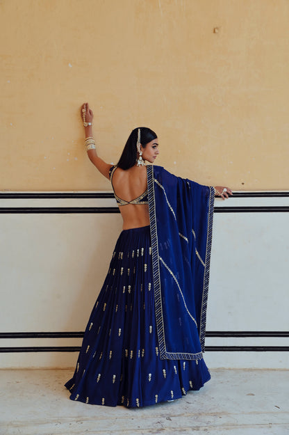 ROYAL BLUE DEEP NECKLINE EMBROIDERED SLEEVELESS BLOUSE WITH FLORAL BUTTI EMBROIDERED LEHENGA AND DUPATTA- EC-LH-RAHI25-25- RoyalBlue