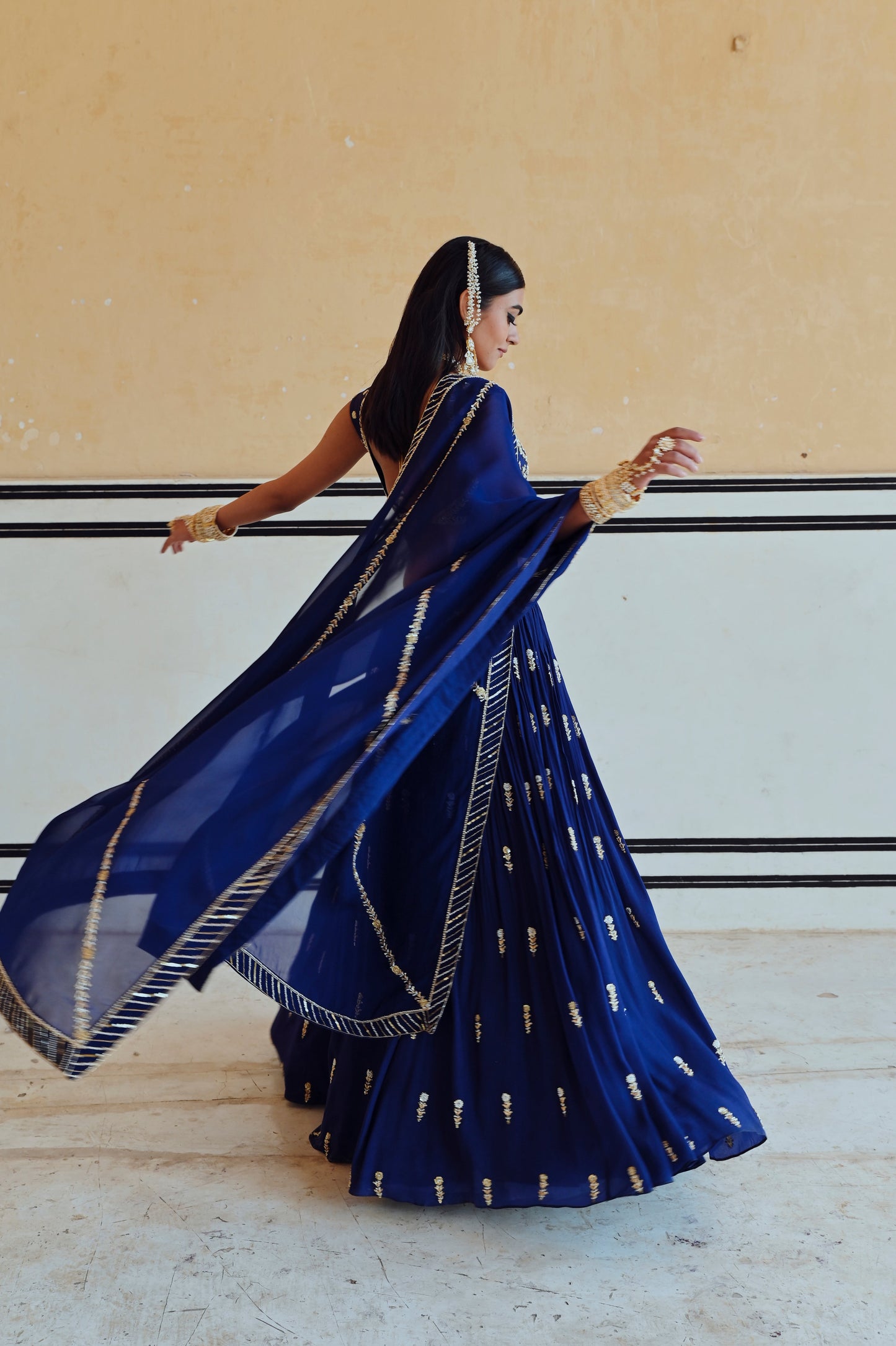 ROYAL BLUE DEEP NECKLINE EMBROIDERED SLEEVELESS BLOUSE WITH FLORAL BUTTI EMBROIDERED LEHENGA AND DUPATTA- EC-LH-RAHI25-25- RoyalBlue
