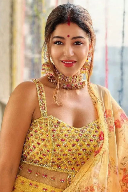 Devoleena in Bright Yellow Net Peplum With Georgette Mokaish Lehenga