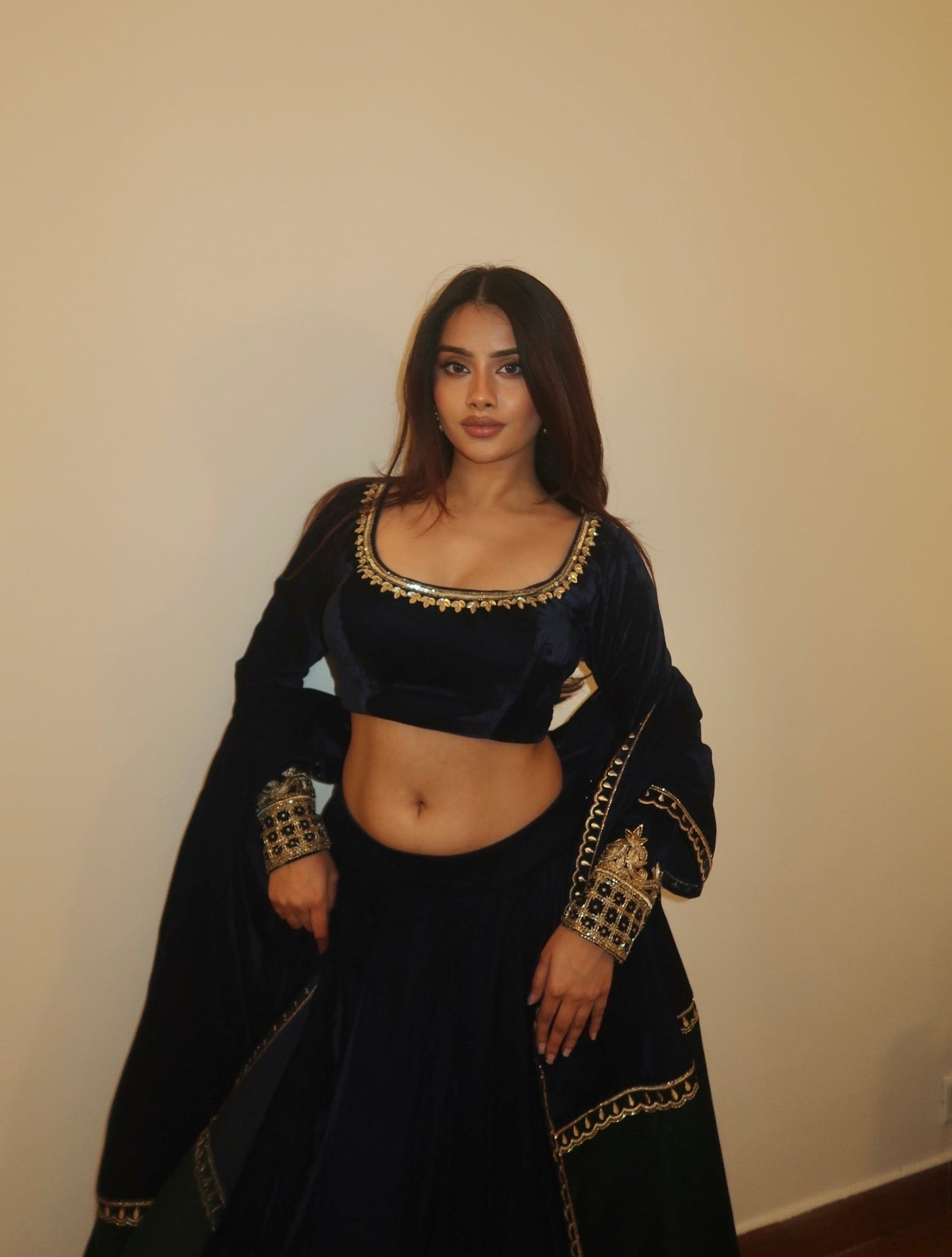 DIVITA IN MULMUL VELVET LEHENGA