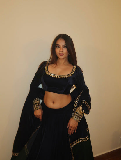 DIVITA IN MULMUL VELVET LEHENGA