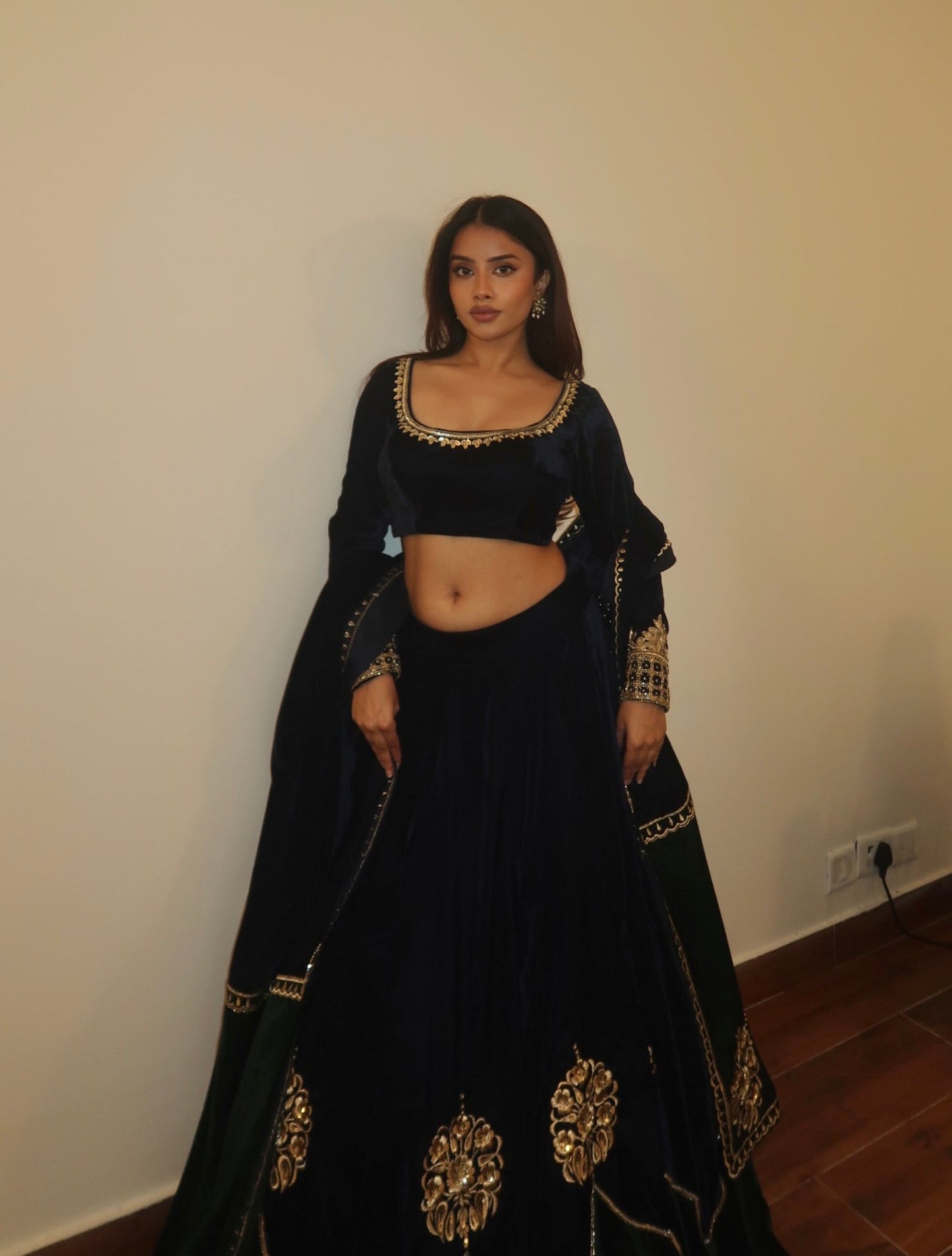 DIVITA IN MULMUL VELVET LEHENGA
