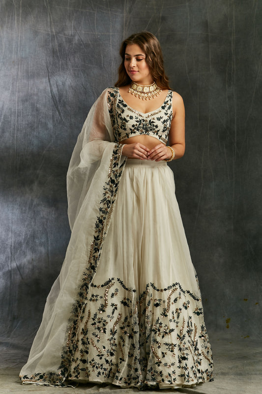 White Organza With Green And Black Threadwork Lehenga