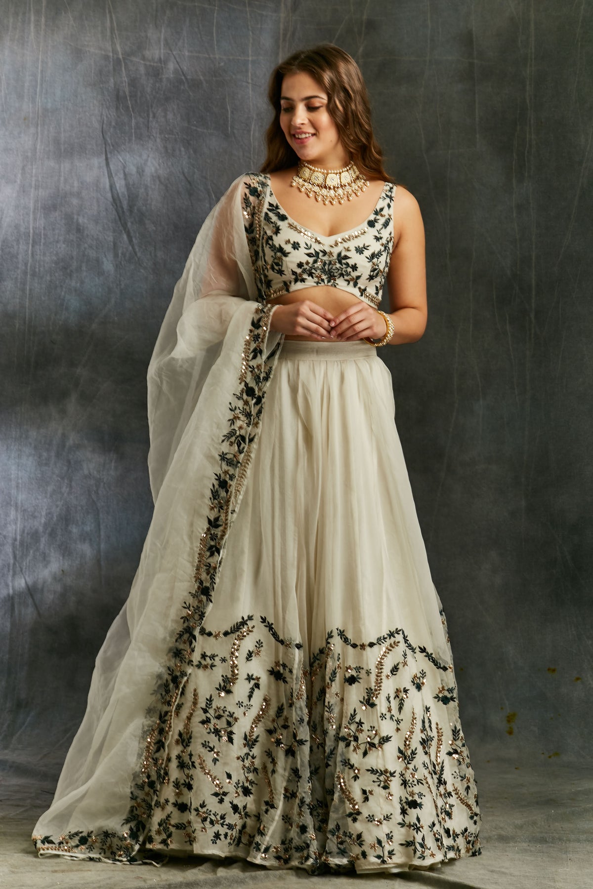White Organza With Green And Black Threadwork Lehenga