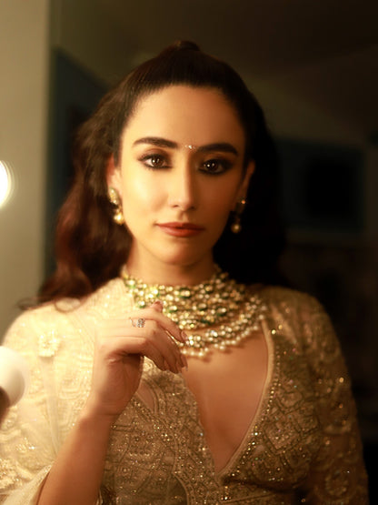 Jonita Gandhi In Light Beige Net Lehenga Choli Set