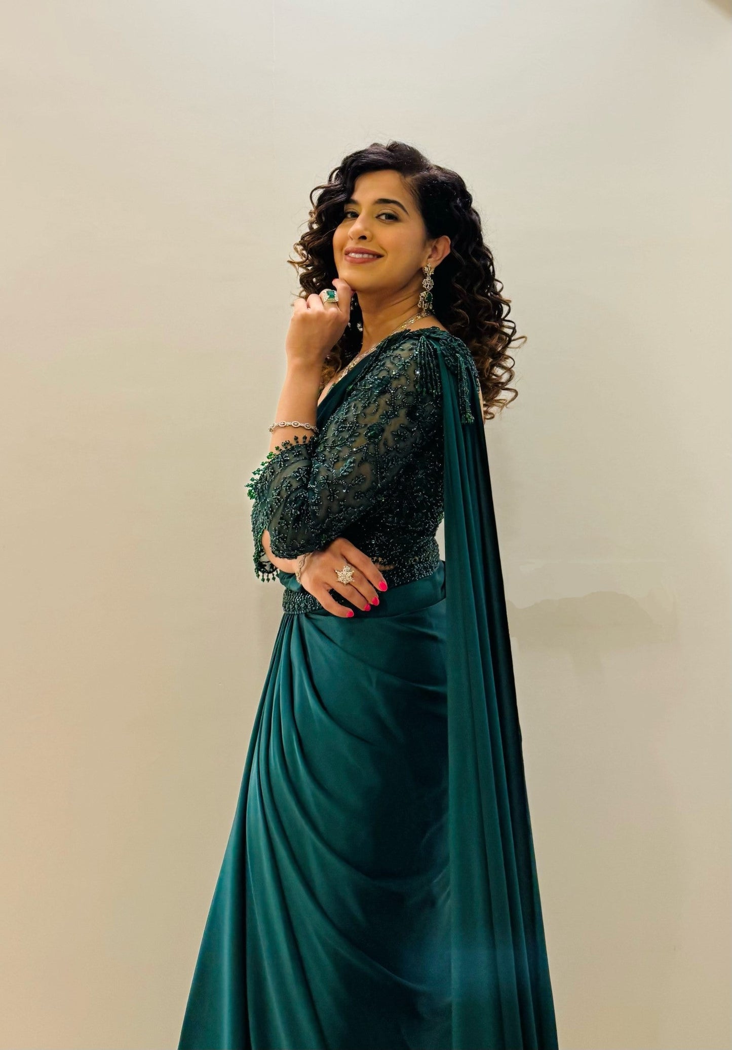 Kamiya Jani In Bottle Green Draped Saree