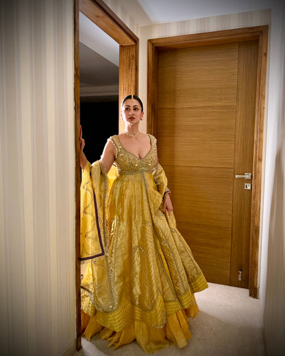 Sukhneet Wadhwa in our Mustard yellow zari tissue jacket with crushed skirt set