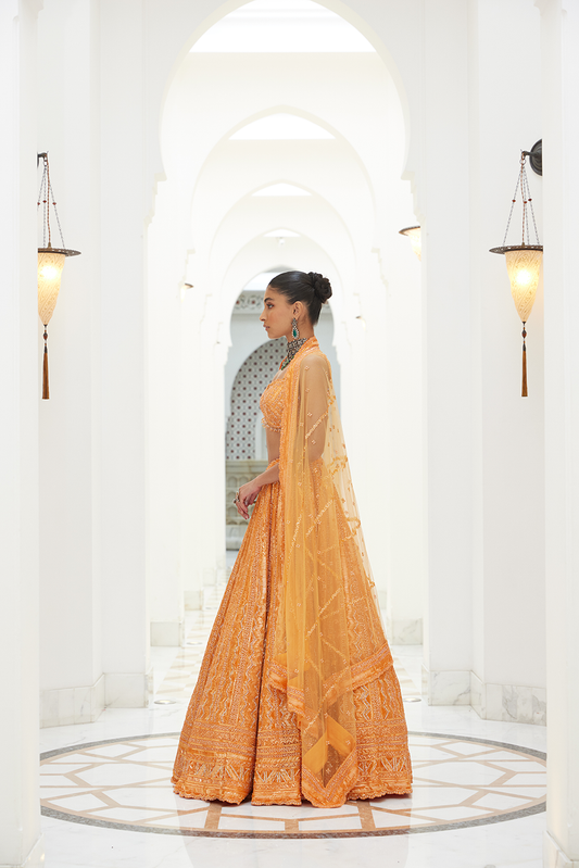 ORANGE NET LEHENGA CHOLI DUPATTA SET
