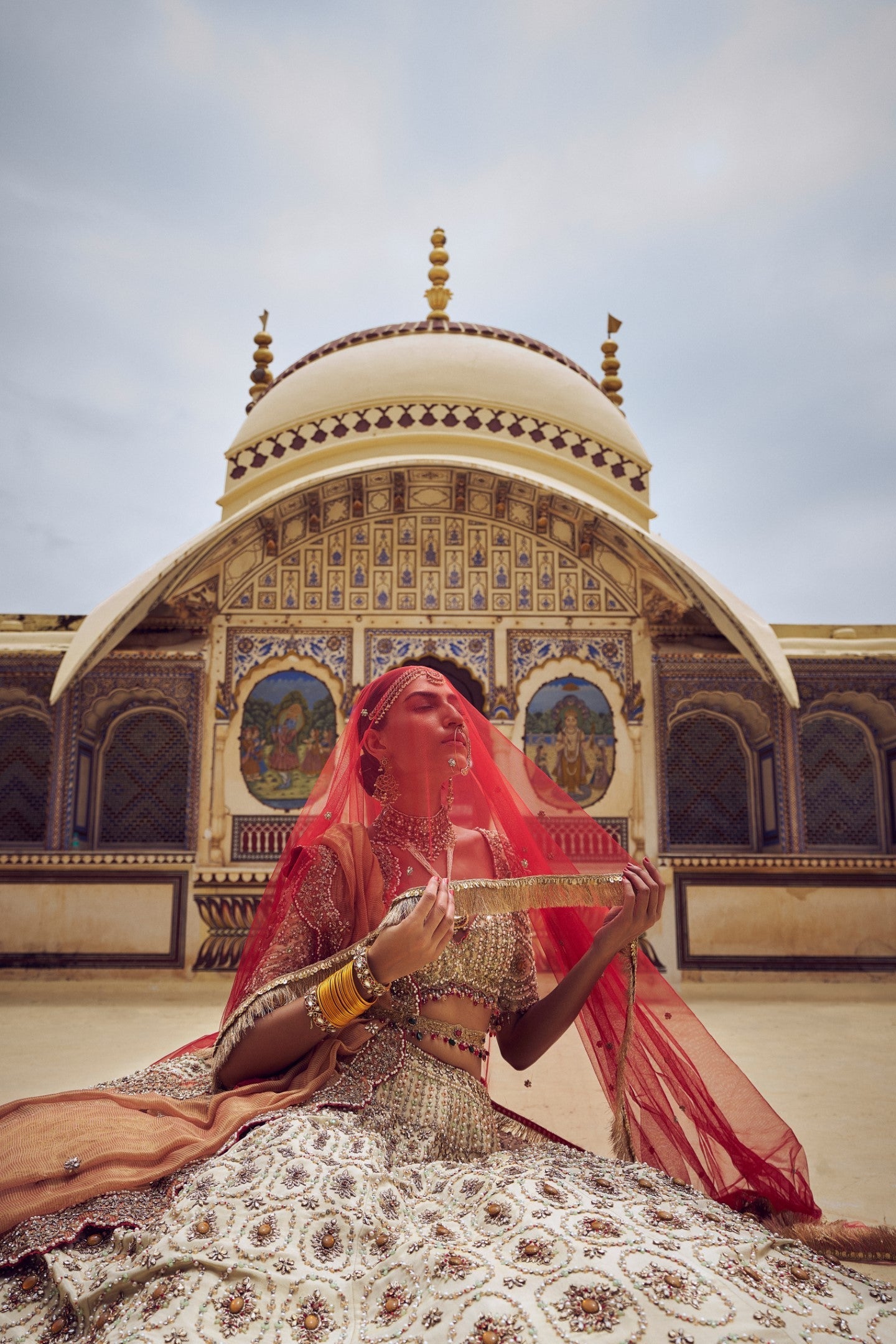 GOLD TISSUE LEHENGA CHOLI WITH A PEACH TISSUE  DUPATTA