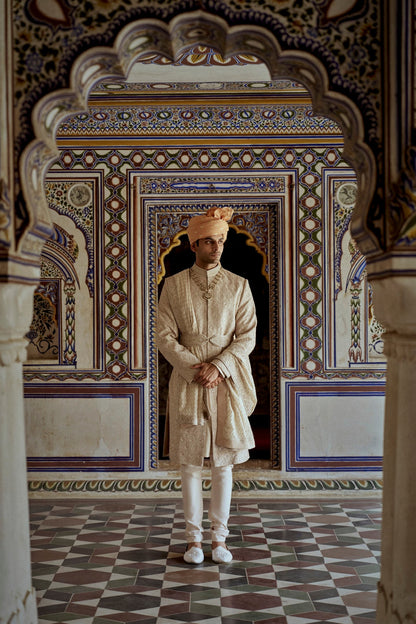 MUSHROOM RAW SILK SHERWANI WITH A COTTON SILK KURTA AND CHURIDAR