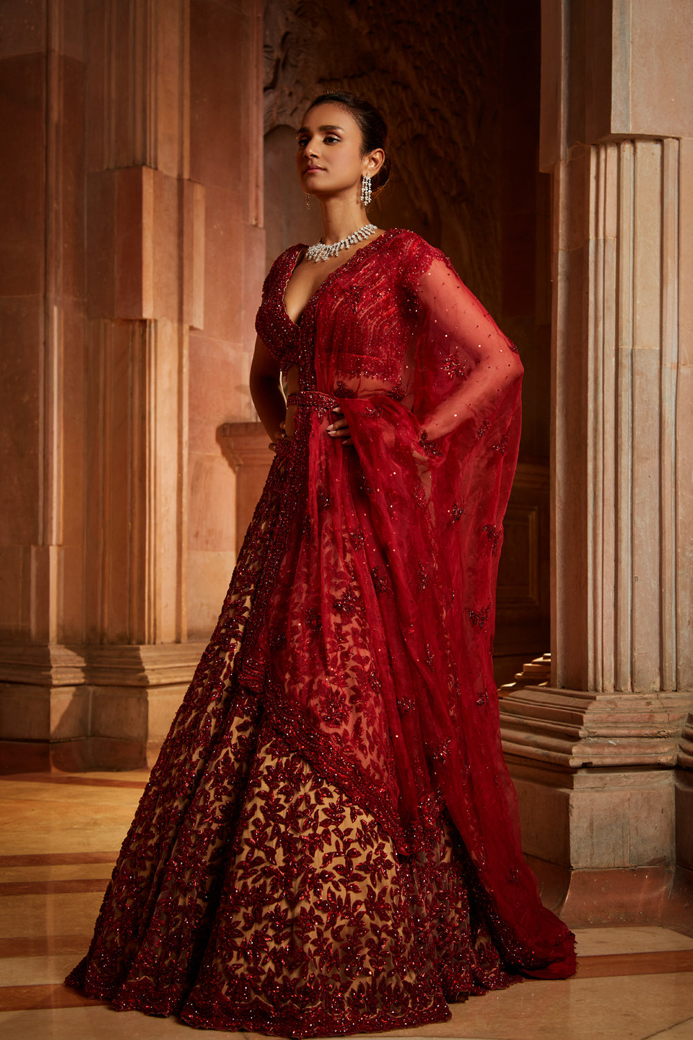 Nude Tulle Lehenga Choli with worked Belt and contrasting Organza Dupatta with an Optional Tulle Veil
