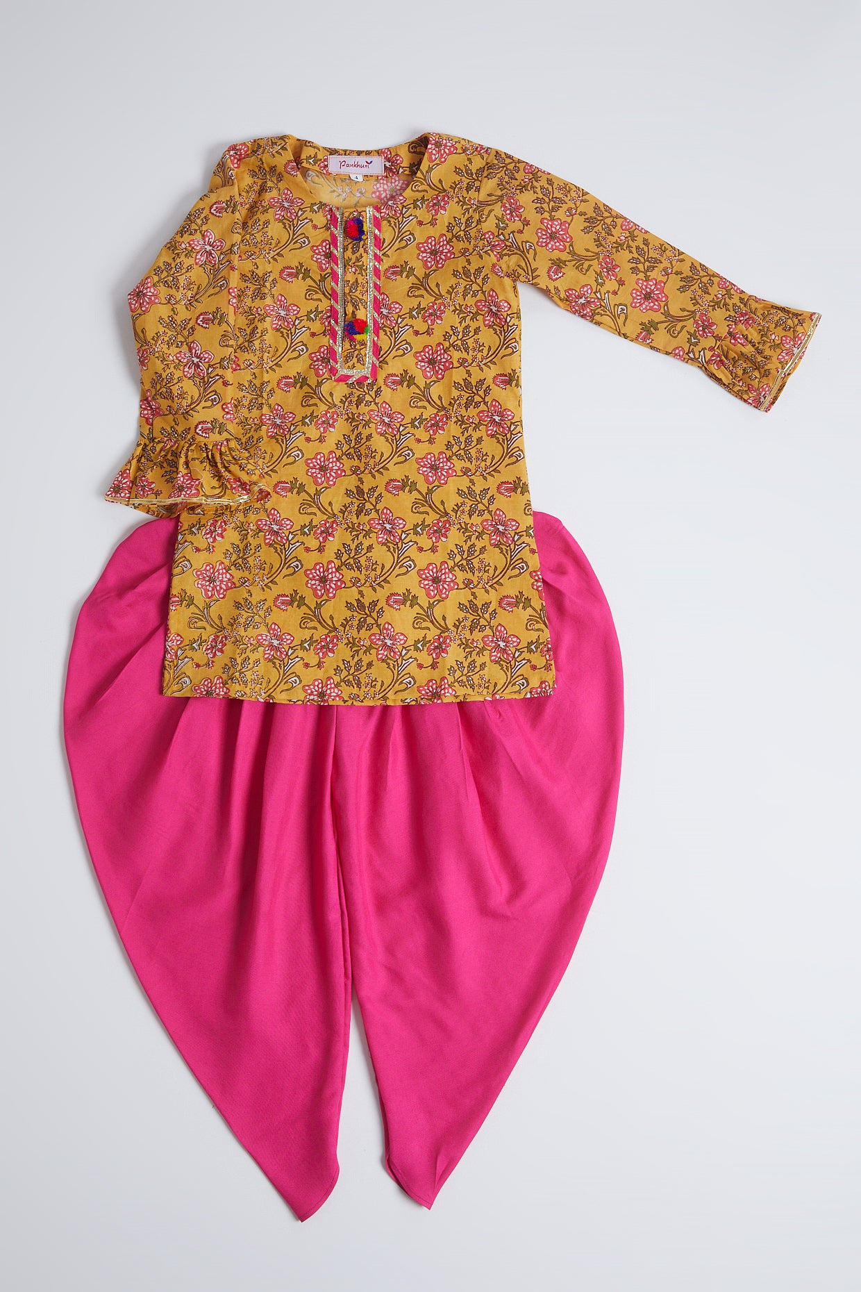 Turmeric Yellow & Pink Printed Dhoti Set For Girls by Pankhuri by Priyanka - Kids at Pernia's Pop Up Shop
