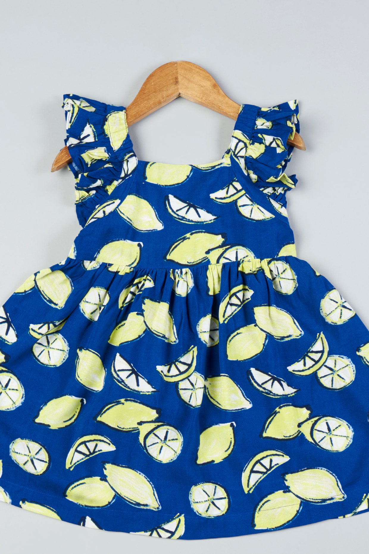 Blue Printed Frilled Frock For Girls by Pankhuri by Priyanka - Kids at Pernia's Pop Up Shop