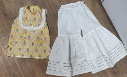 Yellow block print kurta with white garara set