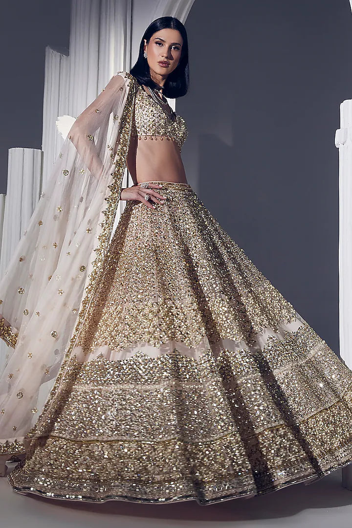 Powder peach net pearl & sequins embroidered lehenga set