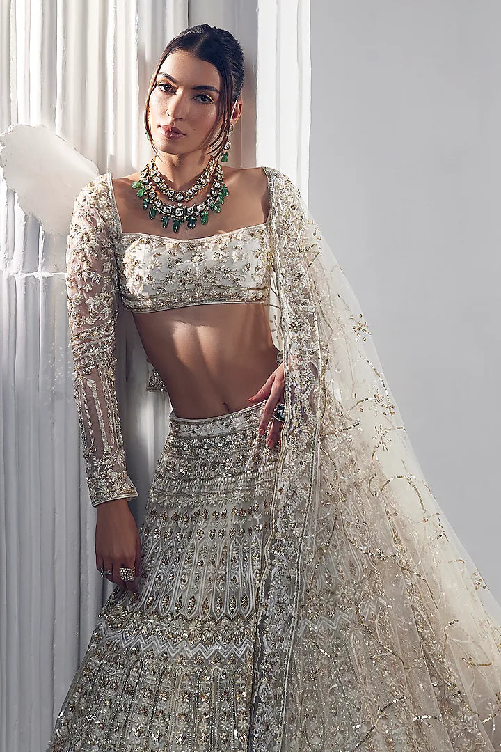 Ivory net thread embroidered lehenga set