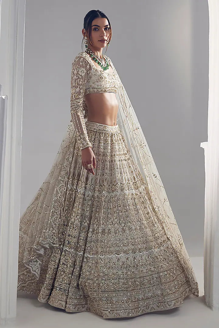 Ivory net thread embroidered lehenga set
