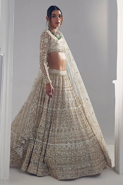 Ivory net thread embroidered lehenga set