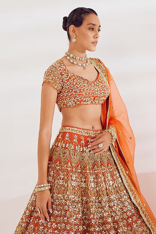Burnt orange net sequins embroidered lehenga set