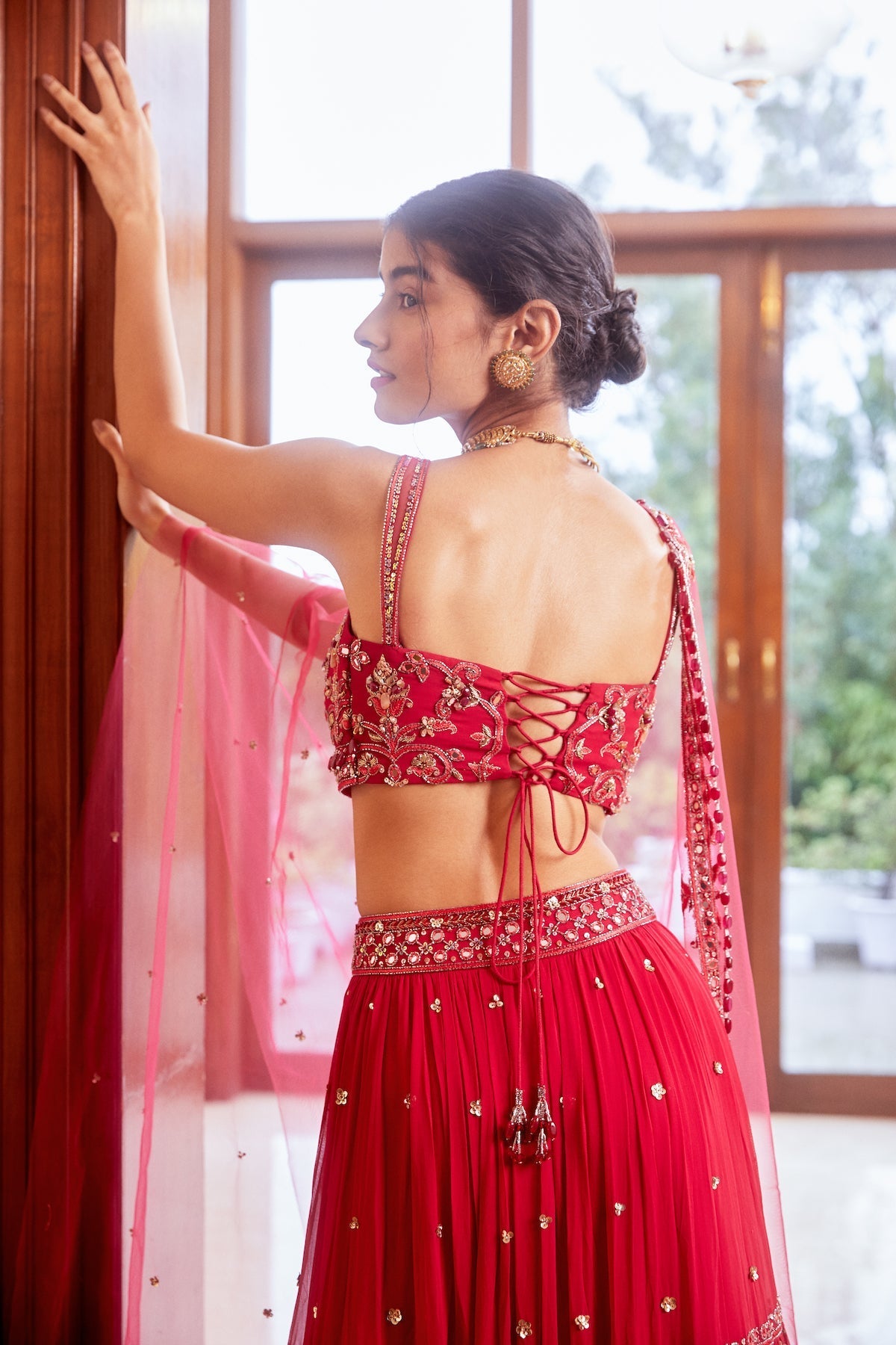 Meher in  Fuchsia Three Tiered Lehenga with Blouse and Dupatta Set