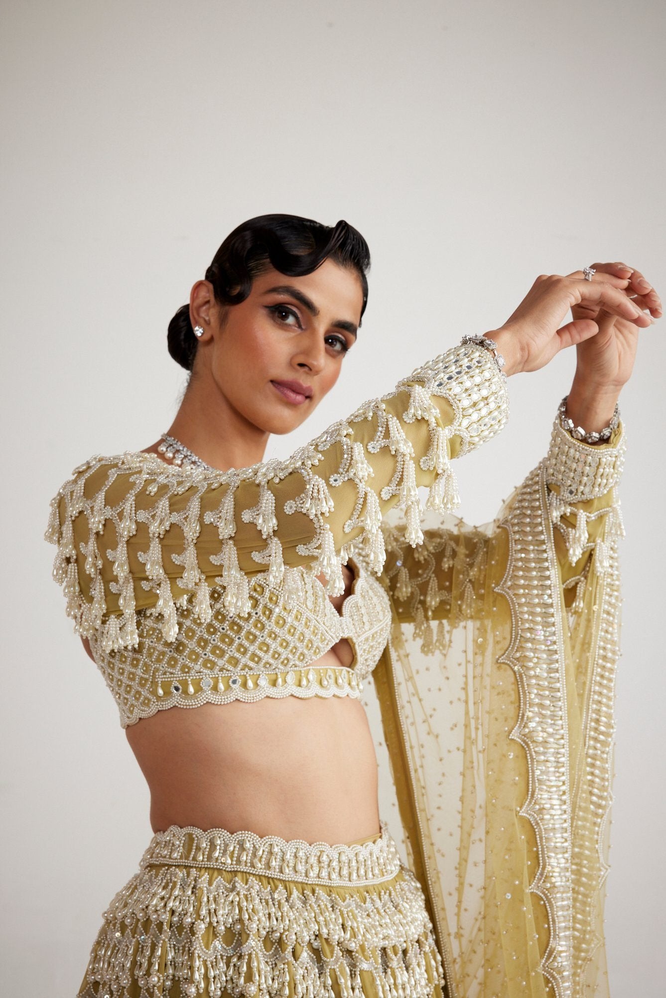 Fern Green Chandelier Pearl Drop Heavy Lehenga set