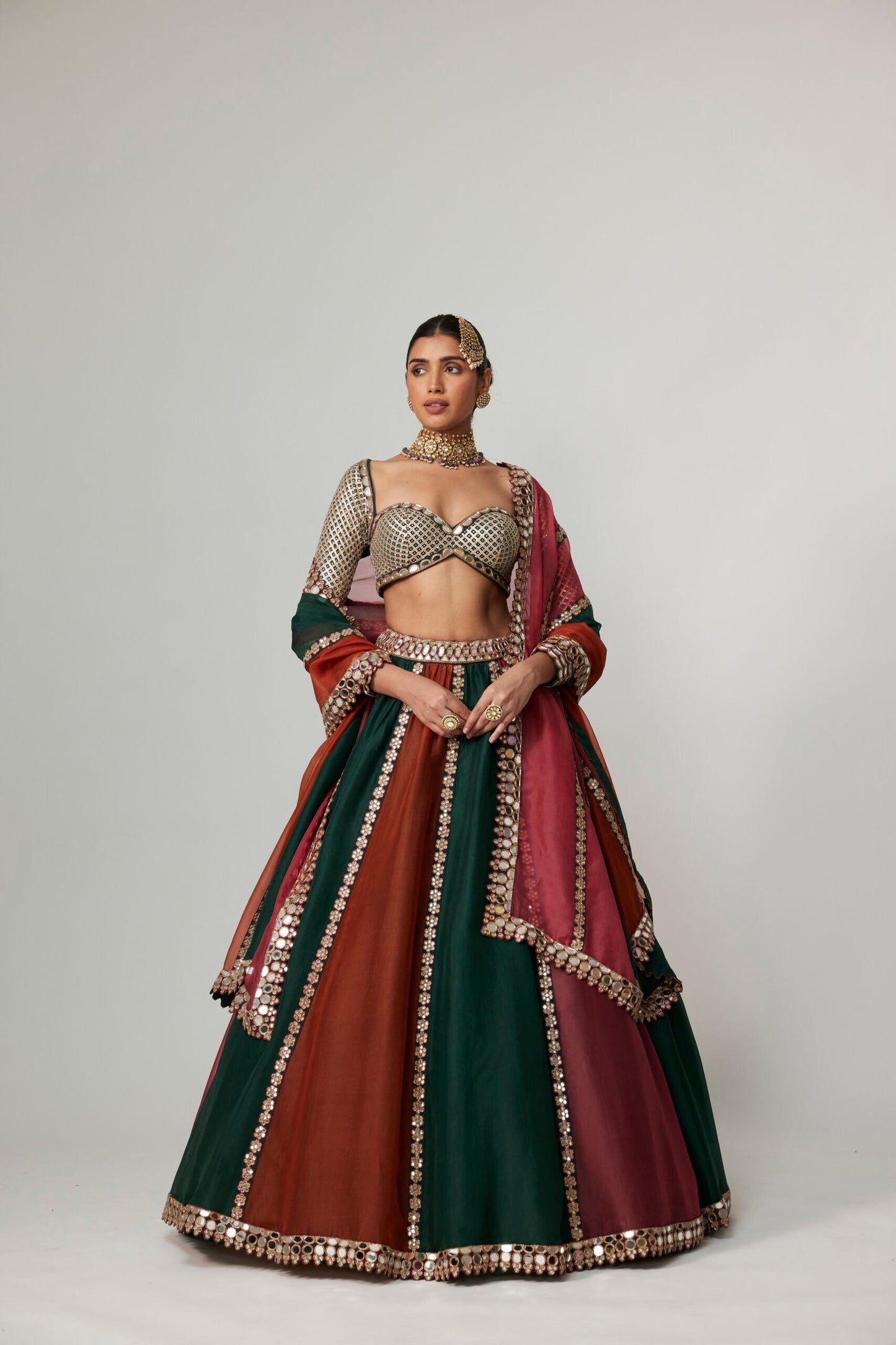 CRANBERRY MULTICOLOR LINEAR LEHENGA WITH SWEETHEART FULL SLEEVE BLOUSE.