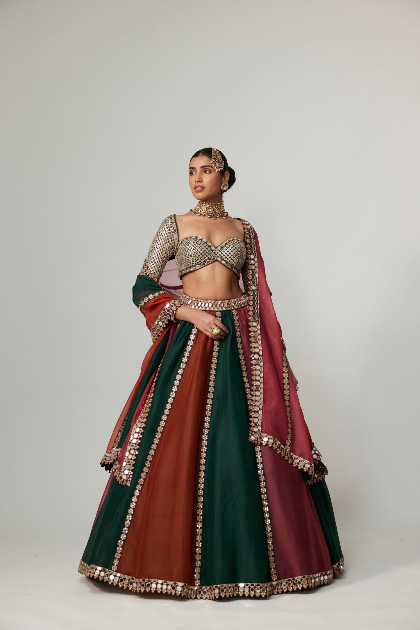 CRANBERRY MULTICOLOR LINEAR LEHENGA WITH SWEETHEART FULL SLEEVE BLOUSE.