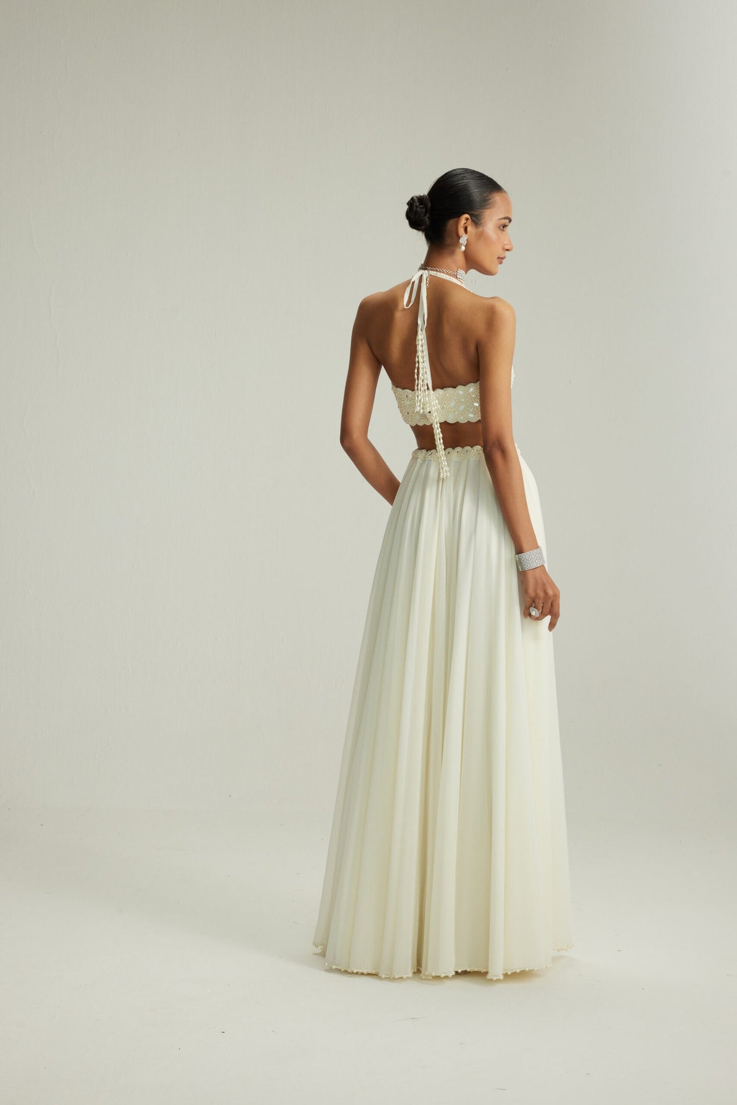 Off White Skirt Set With Halter Neck Blouse