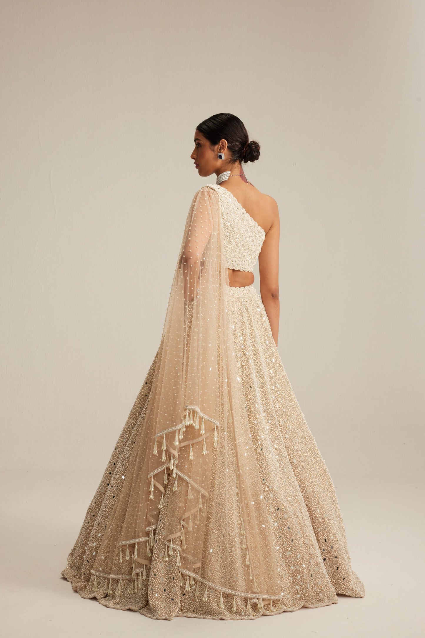 Light Beige Dense mirror and pearl one shoulder lehenga set