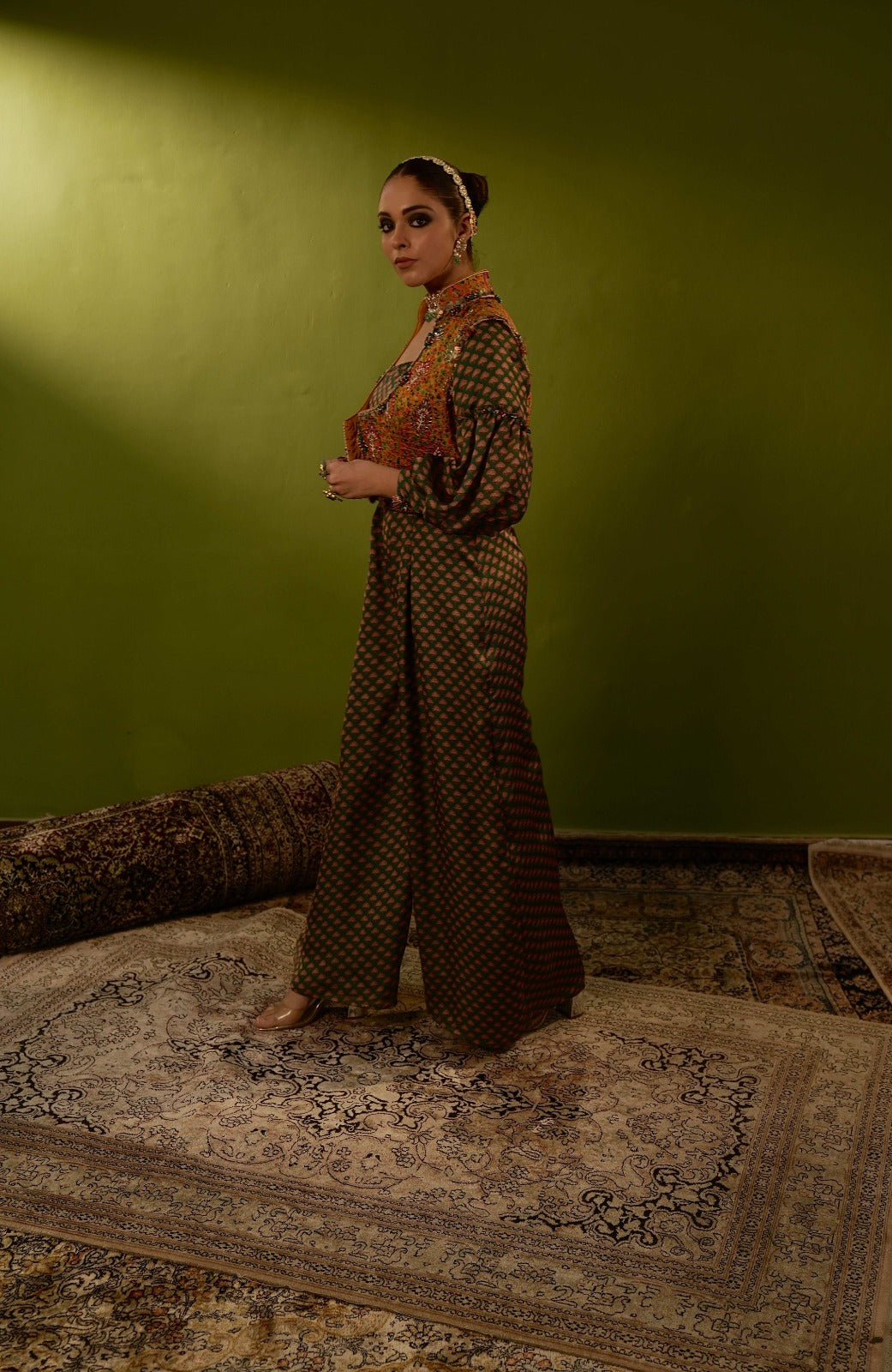 Green jumpsit with mustard yellow jamawar jacket