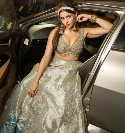 Aamna Sharif in our Pearl gold silk zari tissue lehnga set