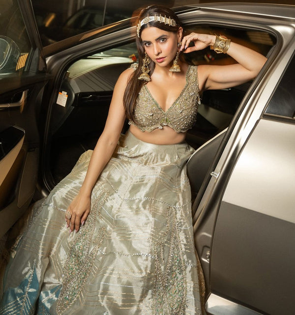 Aamna Sharif in our Pearl gold silk zari tissue lehnga set