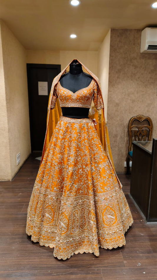 Rust Raw Silk Zari Hand & Machine Embroidered Lehenga Set