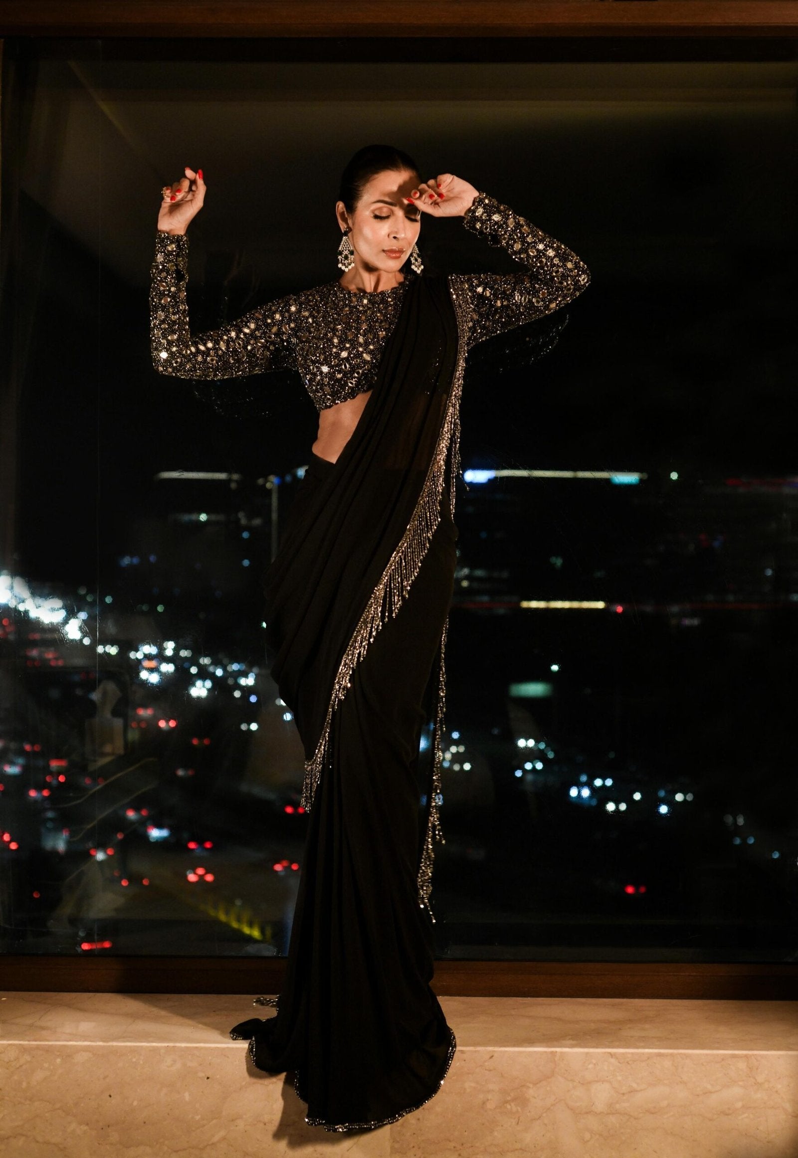 MALAIKA ARORA in Black Georgette Tassel Saree