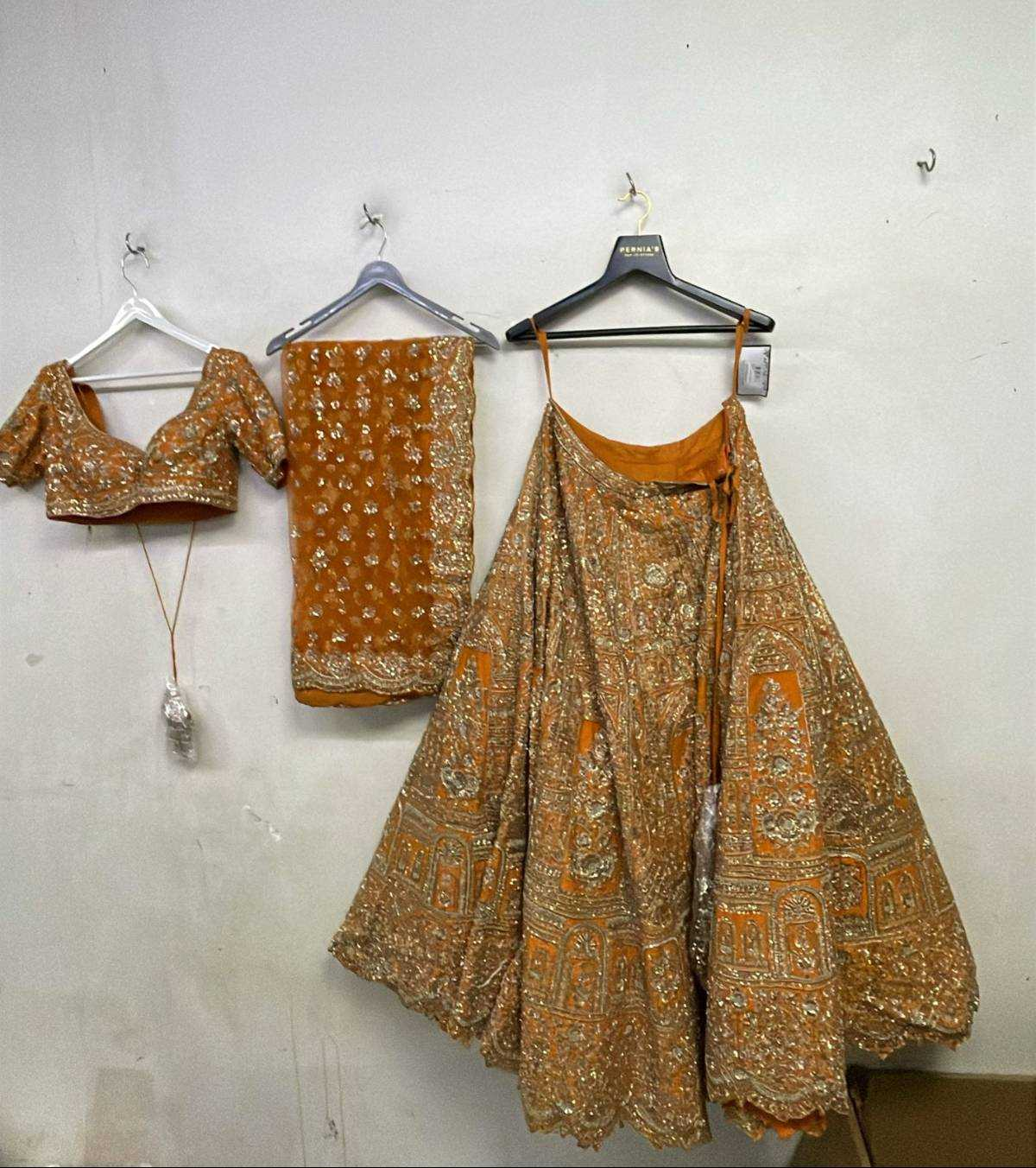 Rust Raw Silk Zari Hand & Machine Embroidered Lehenga Set