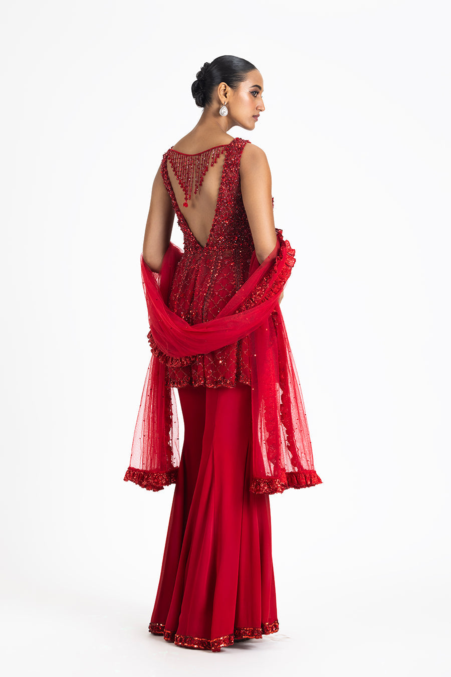Krishna Talesara In RED SHARARA SET