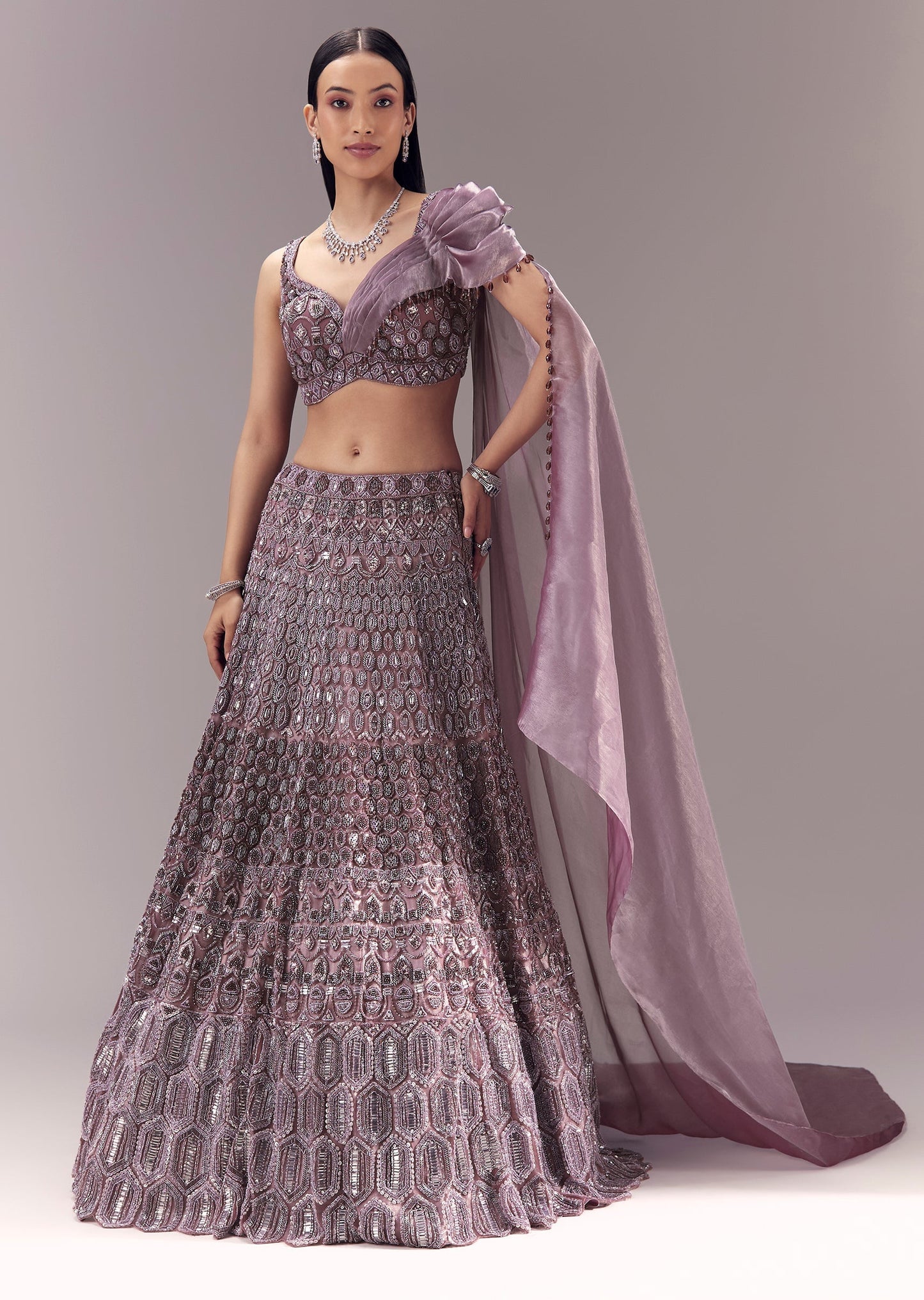 Purple Draped Blouse With Embellished Lehenga