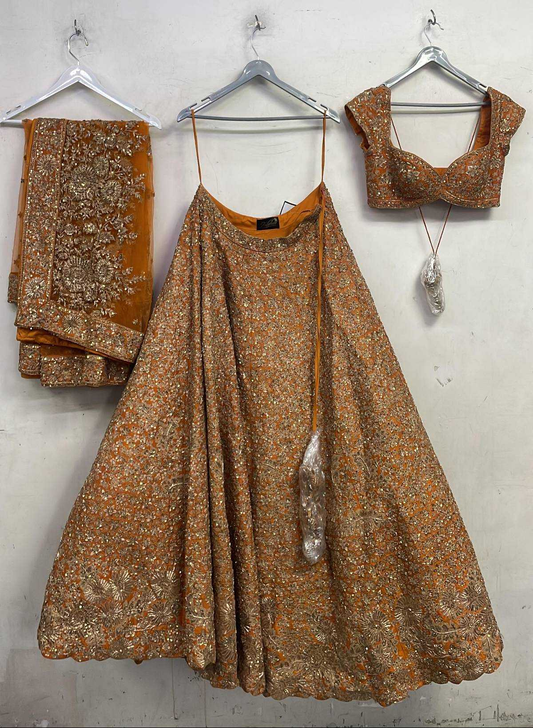 Rust Raw Silk Zari Hand & Machine Embroidered Lehenga Set