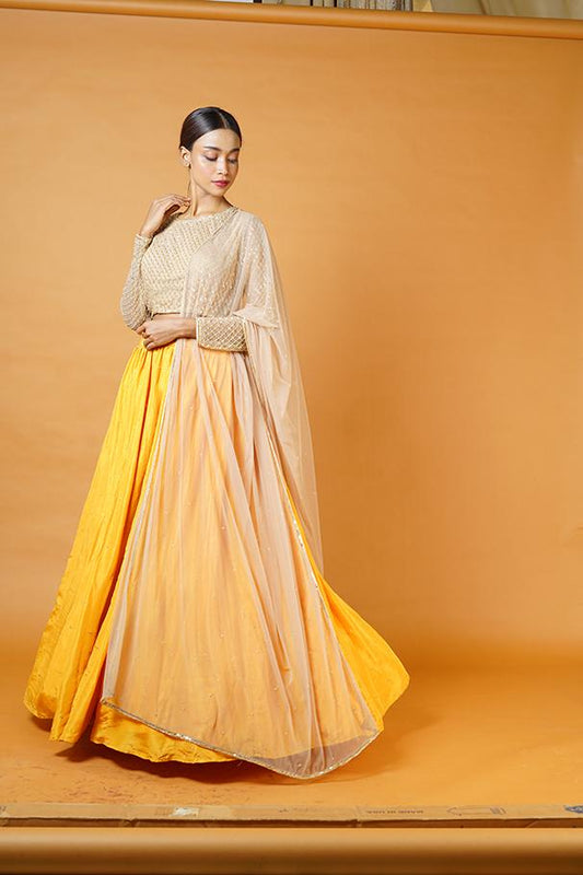 Gold blouse and dupatta with fire yellow lehenga