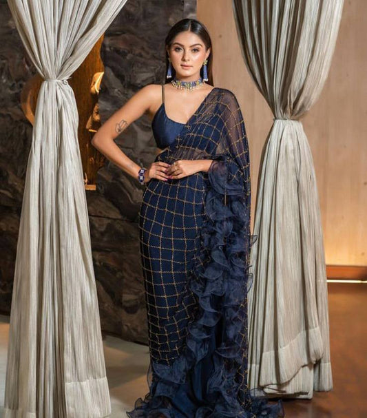 Navy blue drape saree with ruffles and blouse