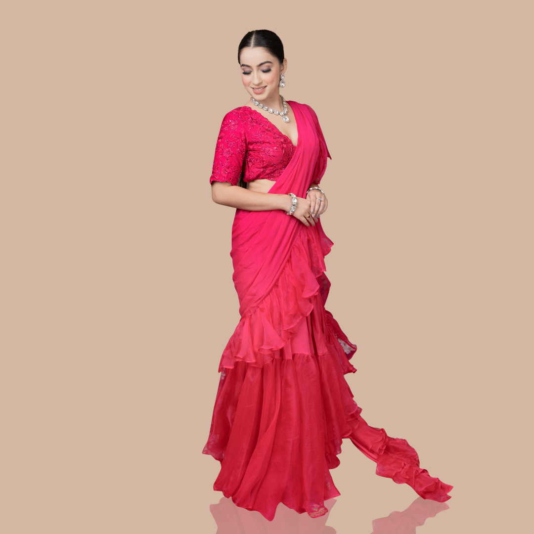 Rani pink drape saree with ruffles and blouse