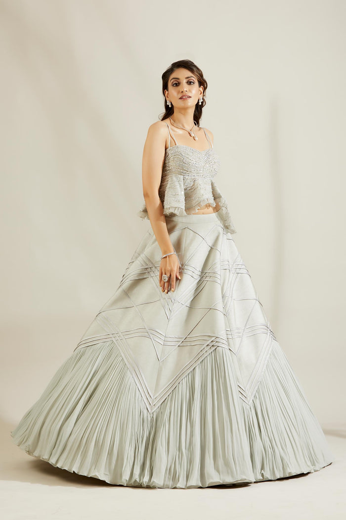 Powder blue lehenga with peplum blouse