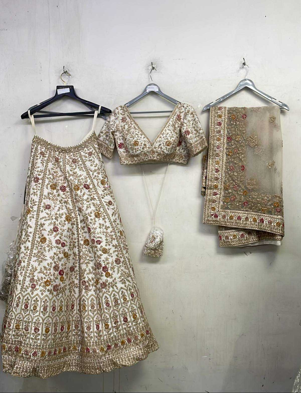 Ivory Raw Silk Zari Hand & Machine Embroidered Lehenga Set